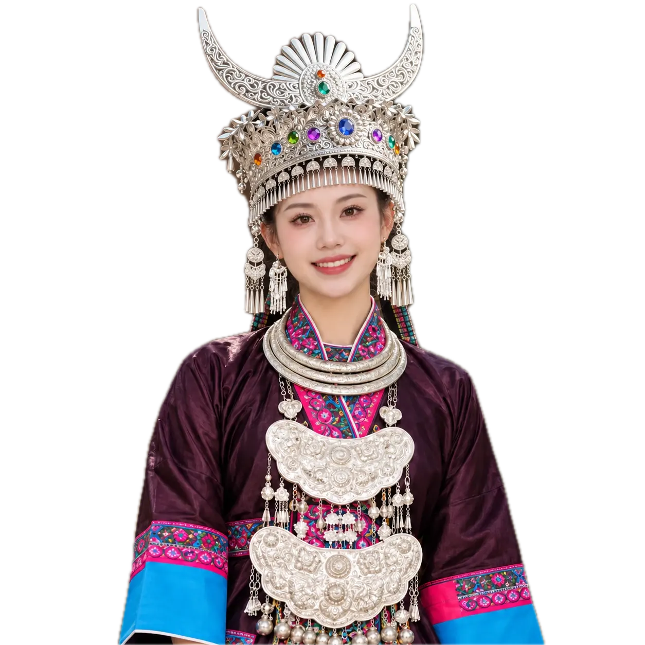 Kamtopia’s ambassador in Kam festival dress: a silver crown, stacked silver neck rings and two engraved collar plates over a glossy jacket